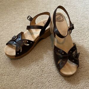 Dansko Sandals. Brown ankle strap and adjustable store strap. Stylish! Size 9.